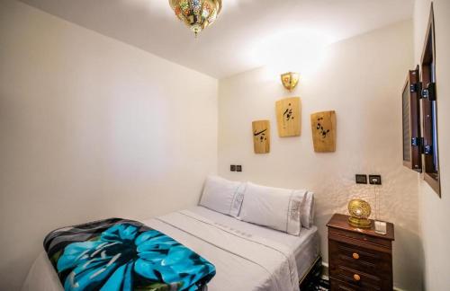 Postel nebo postele na pokoji v ubytování Nabil dar