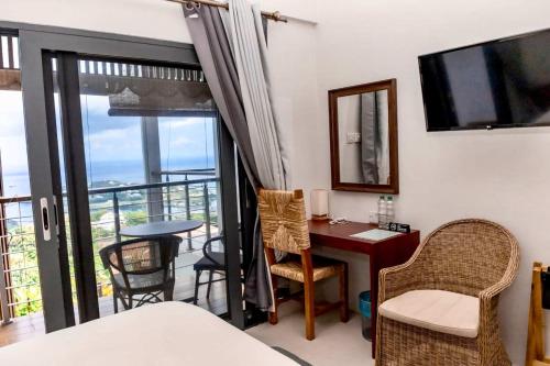 Μια τηλεόραση ή/και κέντρο ψυχαγωγίας στο ZenBreak Hammock Suite PatPat