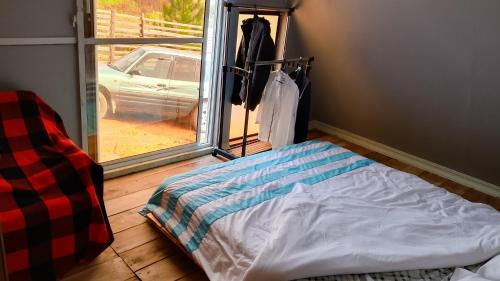 Postel nebo postele na pokoji v ubytování Kyenwa homestay