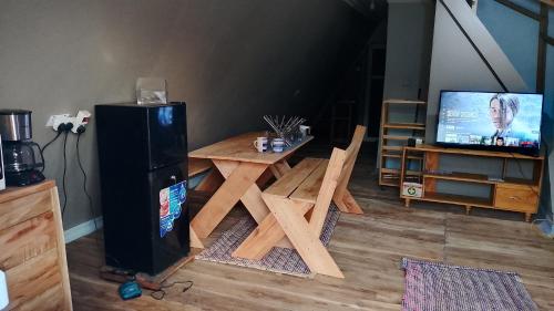 TV a/nebo společenská místnost v ubytování Kyenwa homestay