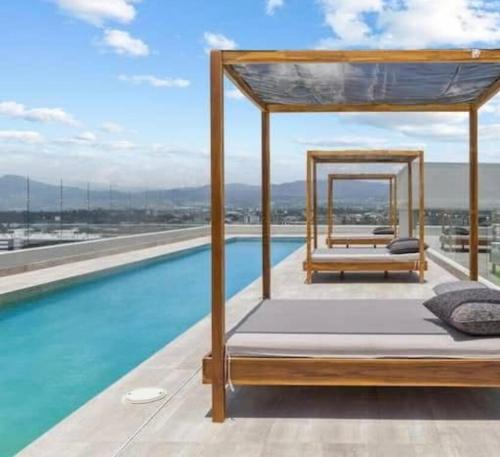 Bazén v ubytování Apartment in zone 10 with Pool & Gym nebo v jeho okolí