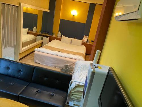 Ένα ή περισσότερα κρεβάτια σε δωμάτιο στο Hotel Lucia at Maebashi Akagi