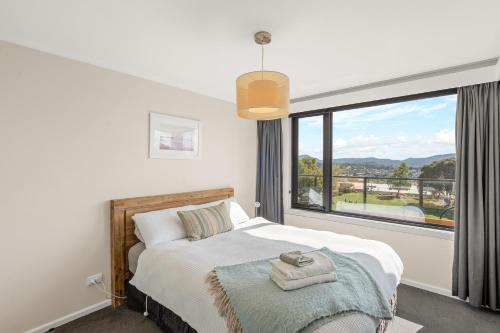 Postel nebo postele na pokoji v ubytování 4onFour