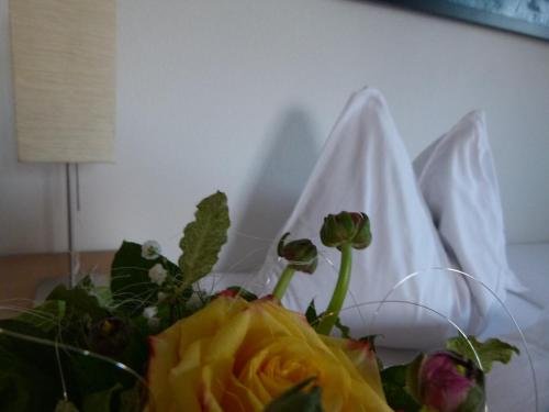 Letto o letti in una camera di Hotel Fischachstubn