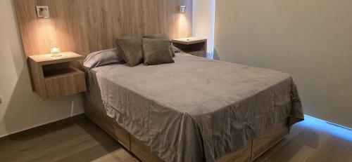 Casa de Agus - Con pileta climatizada 객실 침대