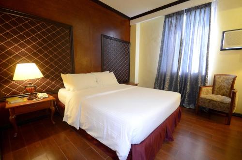 Ένα ή περισσότερα κρεβάτια σε δωμάτιο στο Hotel San Marco