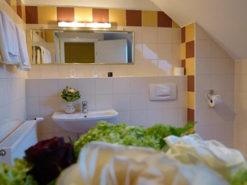 Koupelna v ubytování Hotel Fischachstubn