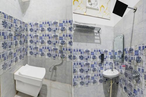 a bathroom with a toilet and a sink at Super Collection O Subedarganj Railway Station Prayagraj in Prayagraj