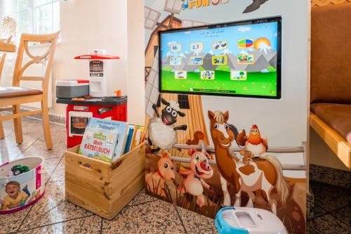 TV a/nebo společenská místnost v ubytování Hotel Nummerhof