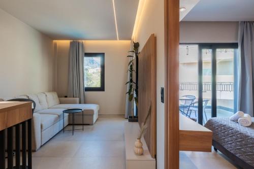 Postel nebo postele na pokoji v ubytování NAMA Suites