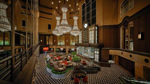 an overhead view of a hotel lobby with chandeliers at Hyatt Regency Tokyo in Tokyo