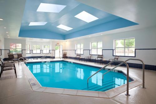 a large swimming pool with a blue ceiling at Hyatt Place Philadelphia/ King of Prussia in King of Prussia