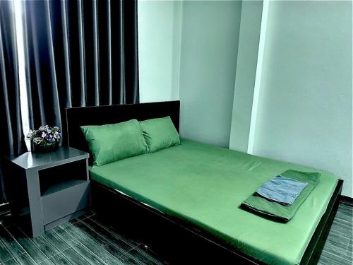 Ένα ή περισσότερα κρεβάτια σε δωμάτιο στο Valor Ha Giang Hostel - Motorbike Tour