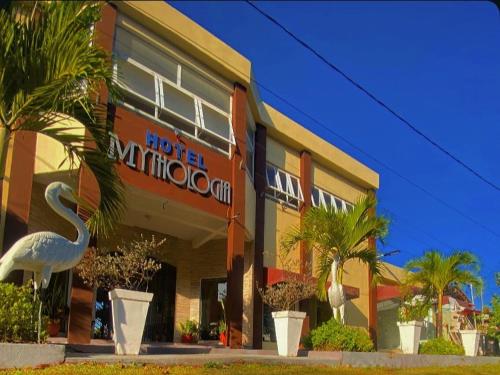 a large building with a large bird in front of it at Hotel Mitologia Algodoal in Algodoal