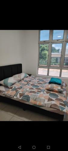 Llit o llits en una habitació de CK Homestay