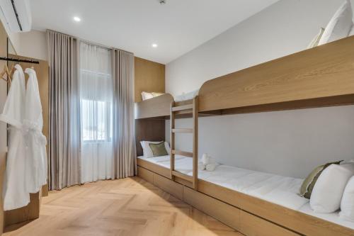 Postel nebo postele na pokoji v ubytování The Hideout, Khorfakkan