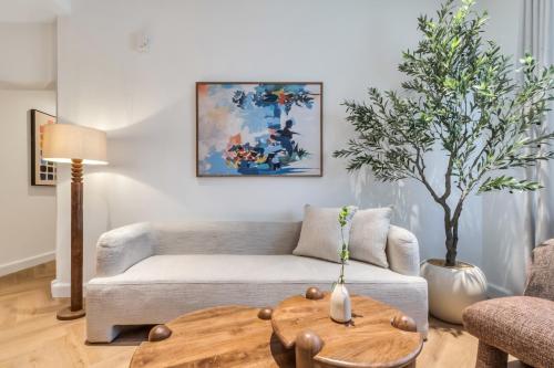 a living room with a couch and a table at The Hideout, Khorfakkan in Khor Fakkan