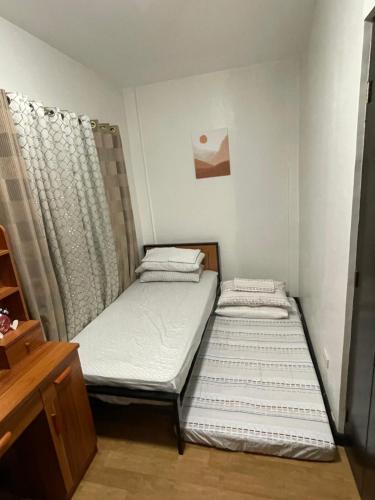 Cama o camas de una habitación en Breezynest in Island Front -by Darysen