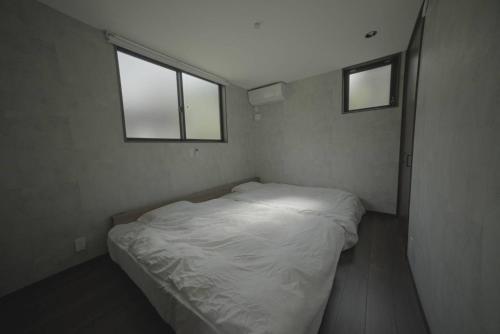 Ένα ή περισσότερα κρεβάτια σε δωμάτιο στο RIVER VIEW HOUSE-Sauna-