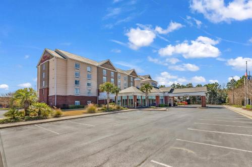 a rendering of a hotel with a parking lot at Hilton Garden Inn Myrtle Beach/Coastal Grand Mall in Myrtle Beach