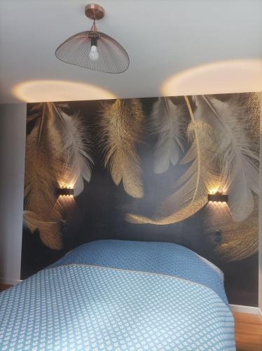 Ένα ή περισσότερα κρεβάτια σε δωμάτιο στο L'émeraude