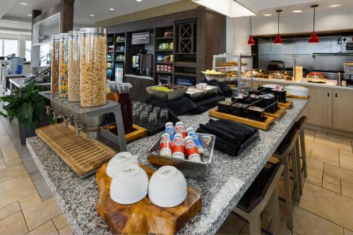 a food counter in a store with food on it at Hilton Garden Inn Memphis/Wolfchase Galleria in Memphis