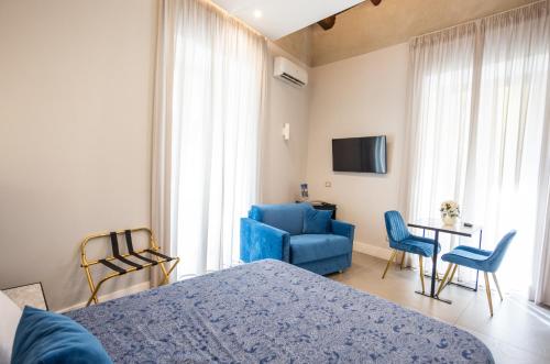 TV a/nebo společenská místnost v ubytování L'Infinito 88 Charmant Rooms