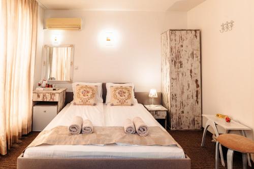 Postel nebo postele na pokoji v ubytování Hotel Kiev