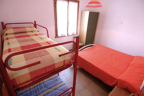 Postel nebo postele na pokoji v ubytování Gorgeous flat 200 mt from the sea