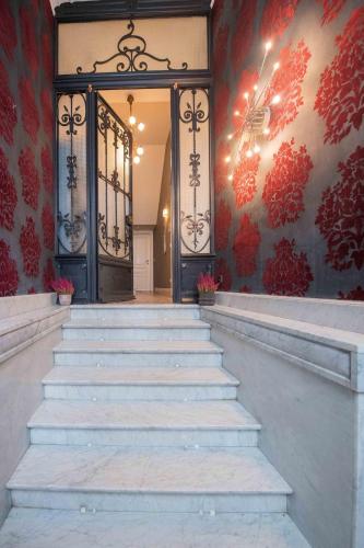 an entrance to a building with stairs leading to a door at Villa Amandine in Ostend