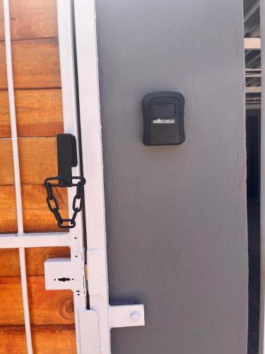 a mailbox on the side of a door at Riverside in Beaufort West