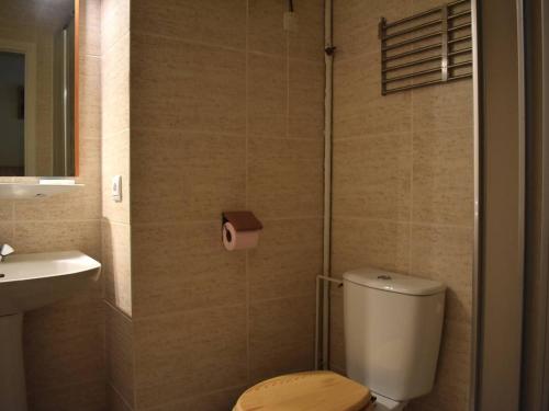 a bathroom with a toilet and a sink at Studio Cabine Confortable - Proche Centre avec Parking - FR-1-580-31 in Font Romeu Odeillo Via