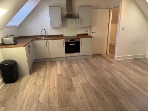 Η κουζίνα ή μικρή κουζίνα στο Flat 9 - Epsom High Street