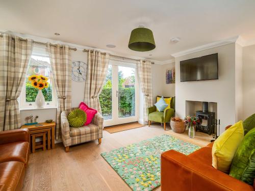 Posezení v ubytování Ridings Cottage