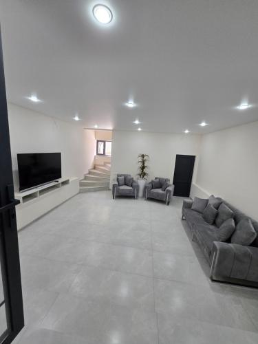 Χώρος καθιστικού στο Ultra Energy Hotel