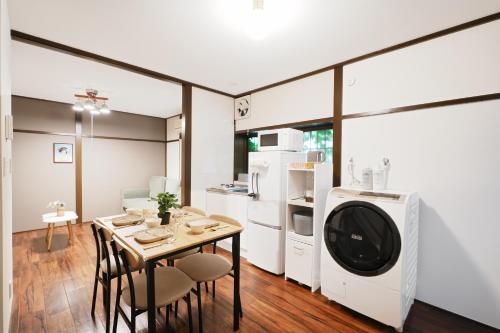 Kuchyň nebo kuchyňský kout v ubytování Kotori Hinoki