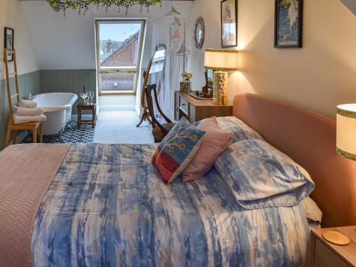 En eller flere senge i et værelse på Harbour View Villa