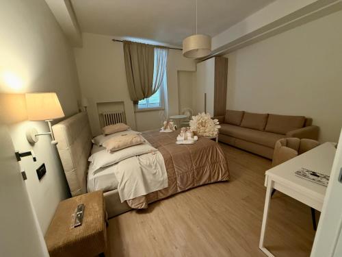 Un ou plusieurs lits dans un hébergement de l'établissement Nontiscordardime