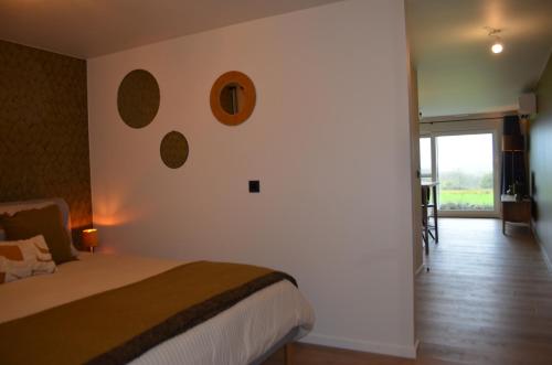 Ένα ή περισσότερα κρεβάτια σε δωμάτιο στο Lavand'in Durbuy