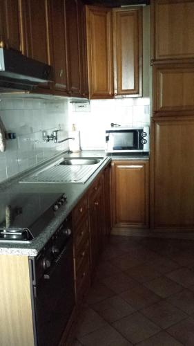 Η κουζίνα ή μικρή κουζίνα στο A Casa di Cristina