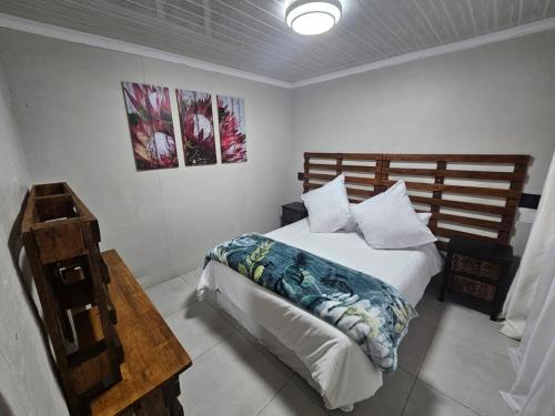 Ένα ή περισσότερα κρεβάτια σε δωμάτιο στο Sally's Place