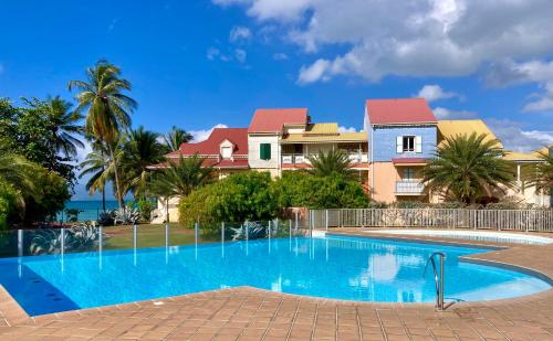 Bazén v ubytování T2 Le Marisol Pool-Beach nebo v jeho okolí