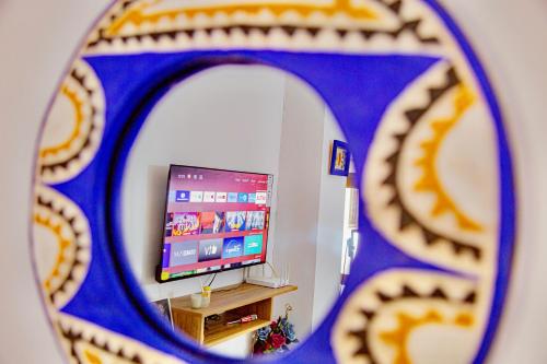 Televisor o centre d'entreteniment de Studio Elma