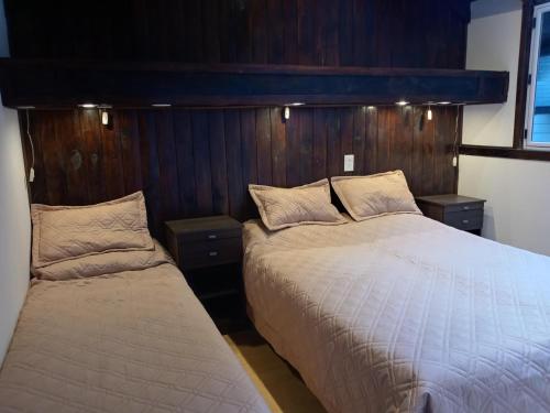 Postel nebo postele na pokoji v ubytování Casa en Bariloche