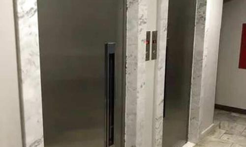 a stainless steel refrigerator in a room at Cozy and comfort bedroom in a private Fancy Condo, safety neighborhood only 20 minutes by car from event - COP30! in Belém