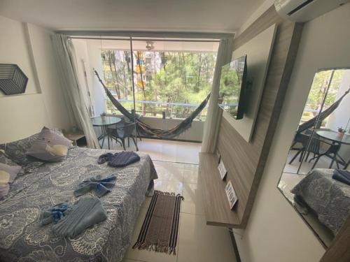 Postel nebo postele na pokoji v ubytování Flat Perfeito - Praia dos Carneiros