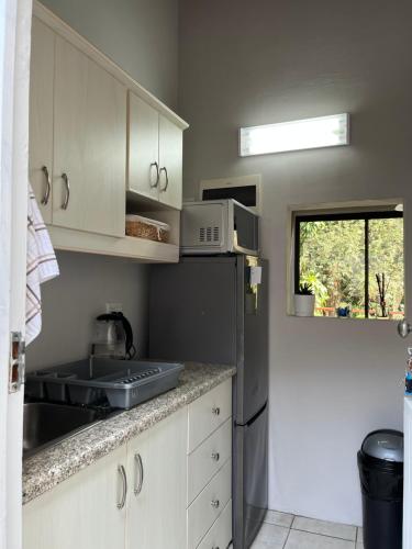 Η κουζίνα ή μικρή κουζίνα στο Place on Lichfield