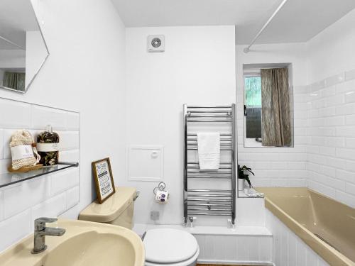 Koupelna v ubytování Old Coach House Ellicombe