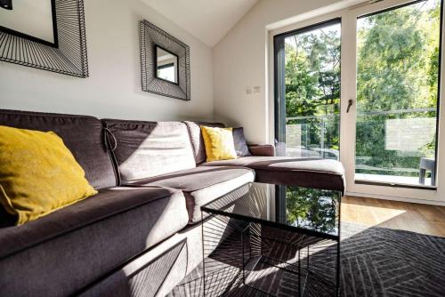 Posezení v ubytování Nowe kameralne Apartamenty Graniczna2G Niechorze - sosnowy las i bardzo blisko plaży