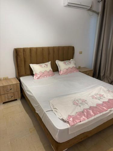 Ένα ή περισσότερα κρεβάτια σε δωμάτιο στο Cosy appartement
